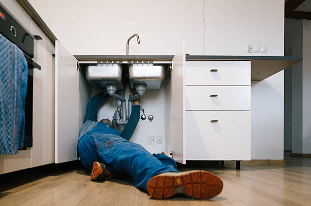 Professional Emergency Plumber technician working in Harrison, WI
